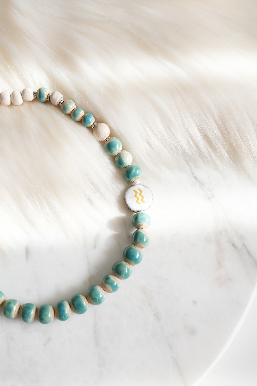 Kova Burcu Toprak Tasarım Kolye